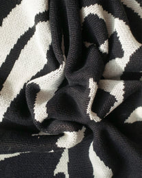 Plume Throw by Aadil Abedi